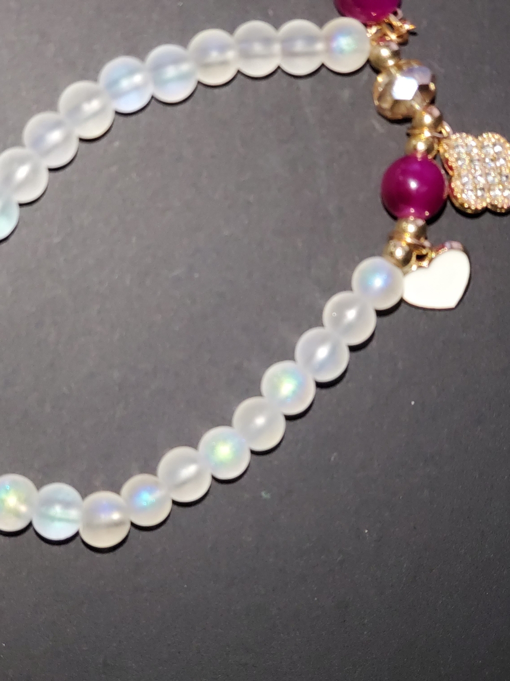 Women’s White Bead Bracelet with Pink Accent and Gold Charms